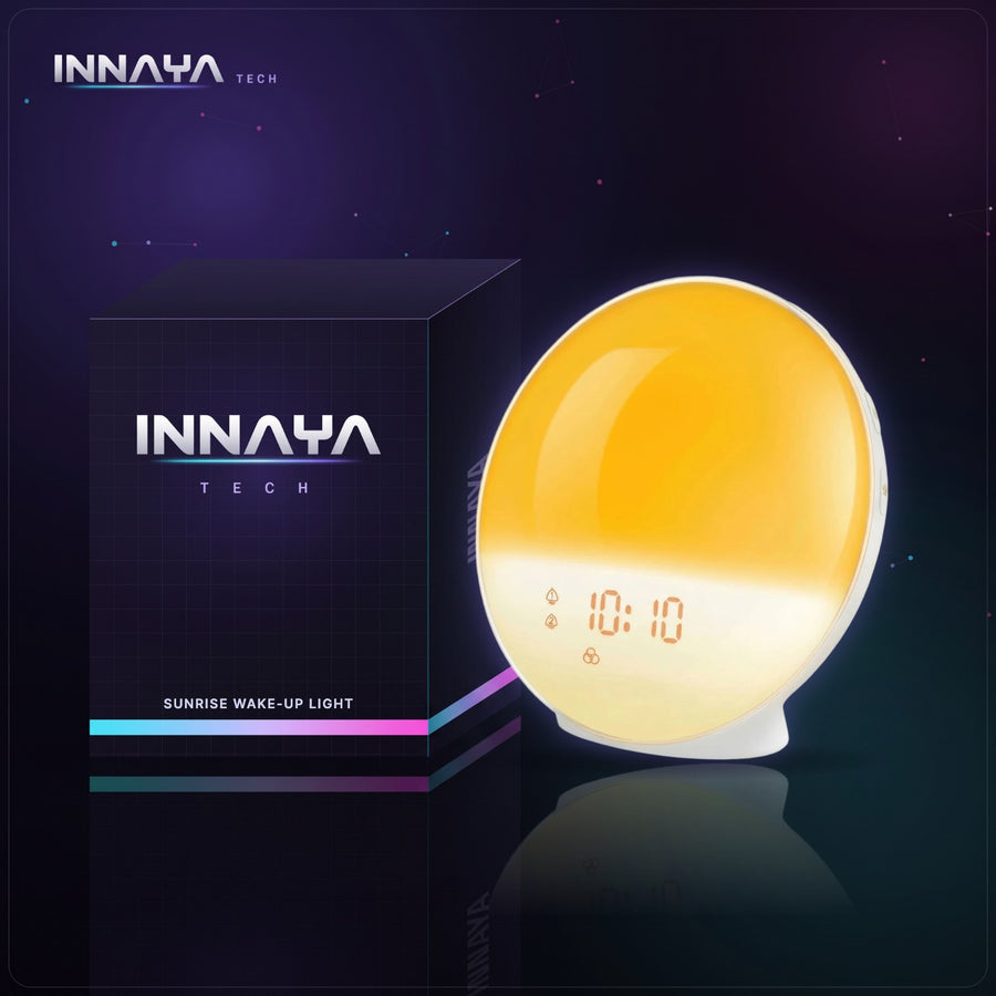 Round sunrise wake-up light alarm clock glowing warm yellow